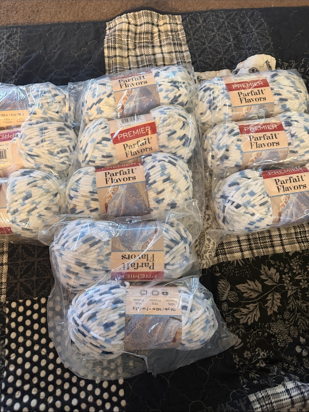11 skeins of Premier Parfait Flavors White and Light Blue Variegated Chunky Yarn